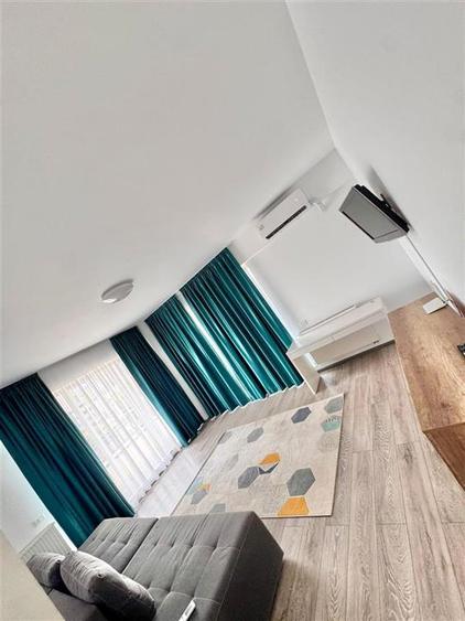 Apartament cu 2 camere decomandat în Tractorul