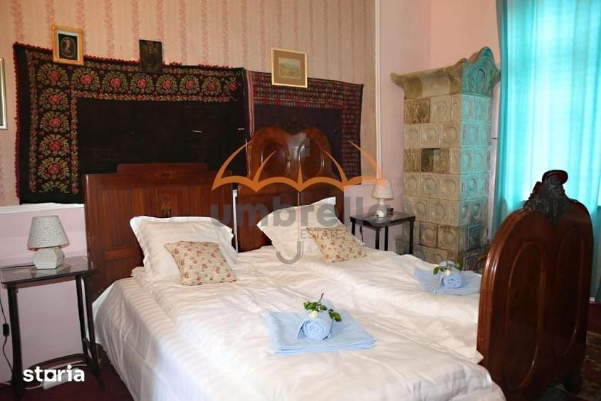Casă cu 7 camere cu Teren 9948 Mp în Arefu