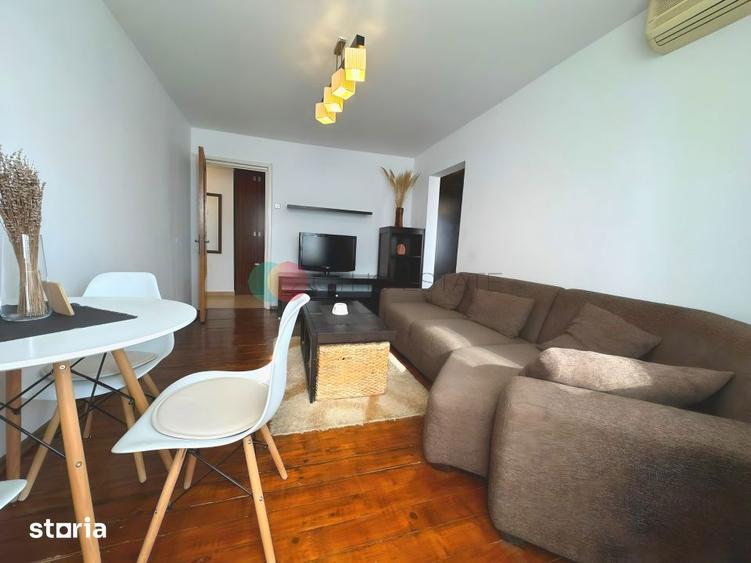Apartament cu 2 camere semidecomandat, mobilat în Tei