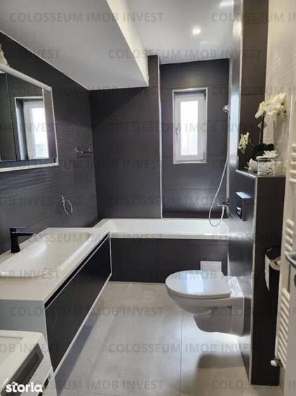Apartament cu 4 camere decomandat în Tractorul
