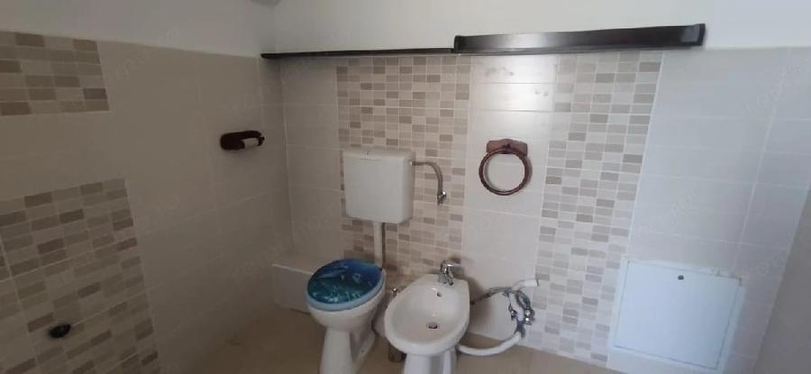 Casă cu Teren 200 Mp în Central