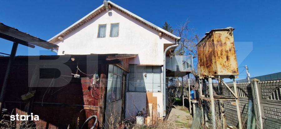 Casă cu 2 camere decomandat cu Teren 748 Mp în Ghercești