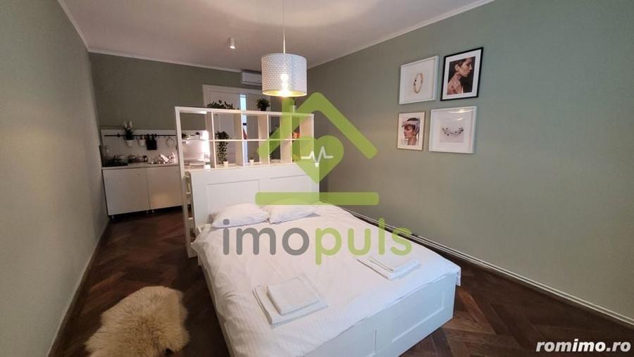 Apartament cu 2 camere semidecomandat, mobilat în Ultracentral
