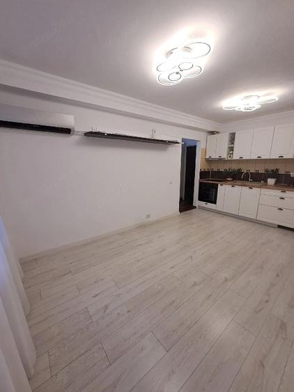 Apartament cu 3 camere decomandat în Ozana