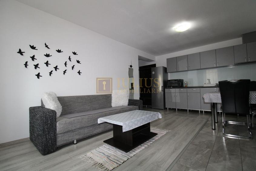 Apartament cu 3 camere semidecomandat, mobilat în Nord