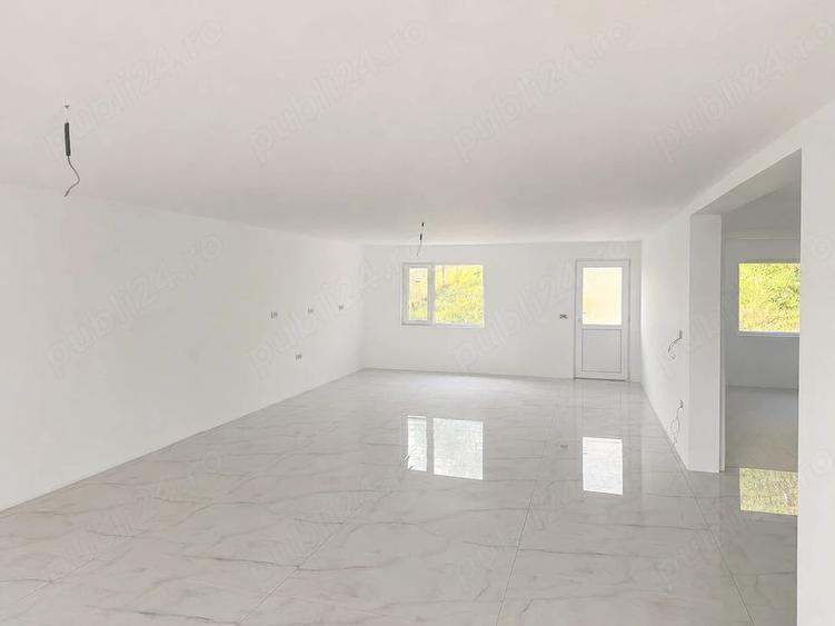 Casă cu Teren 1000 Mp în Central