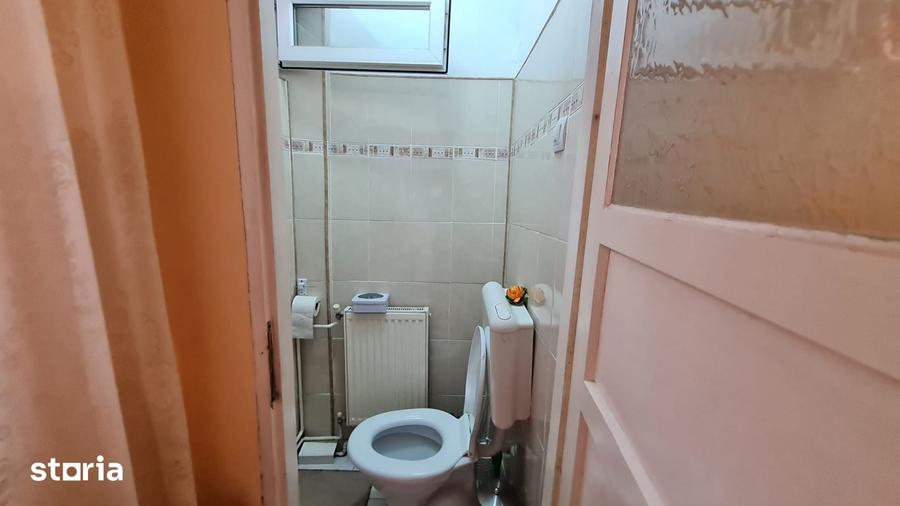 Casă cu Teren 200 Mp în Central