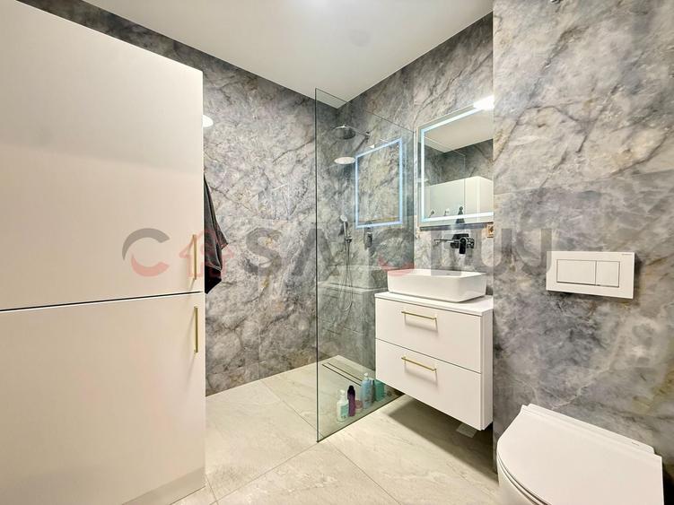 Apartament cu 4 camere semidecomandat, mobilat în Borhanci