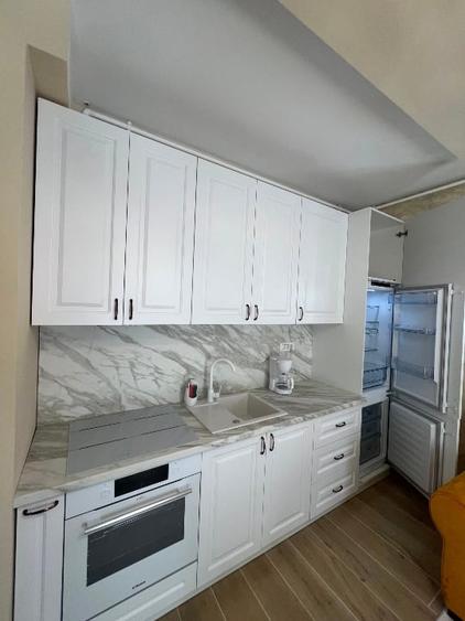 Apartament cu 2 camere semidecomandat, mobilat în Central