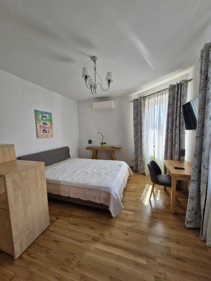 Apartament cu 2 camere decomandat, mobilat în P-ța Romană