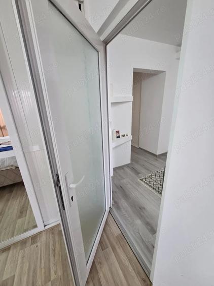 Apartament cu 4 camere decomandat în E3