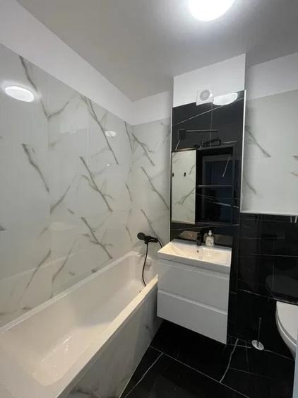 Apartament cu 2 camere semidecomandat, mobilat în Rahova