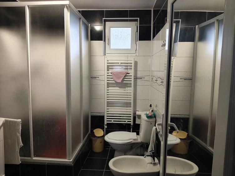 Casă cu Teren 1000 Mp în Central