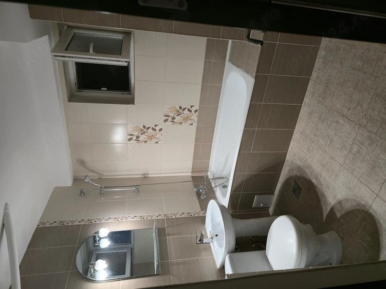 Apartament cu 4 camere decomandat în Central