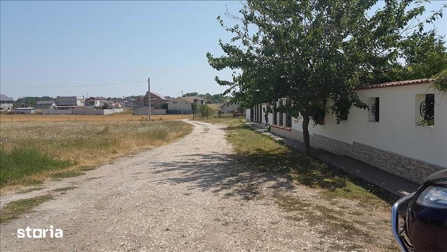 TEREN INTRAVILAN 469 MP. LANGA CASE ZONA DE PERSPECTIVA PRET 17.500 E - 11