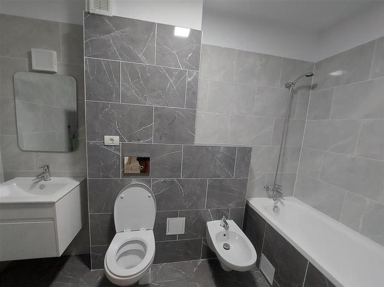 Apartament cu 2 camere semidecomandat, mobilat în Tractorul