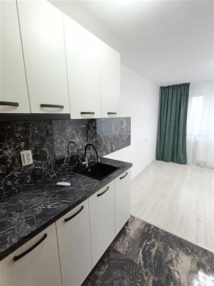 Vanzare garsoniera transformata din camera de camin - 2