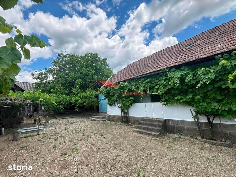 Casă cu 2 camere cu Teren 1000 Mp în Coldău