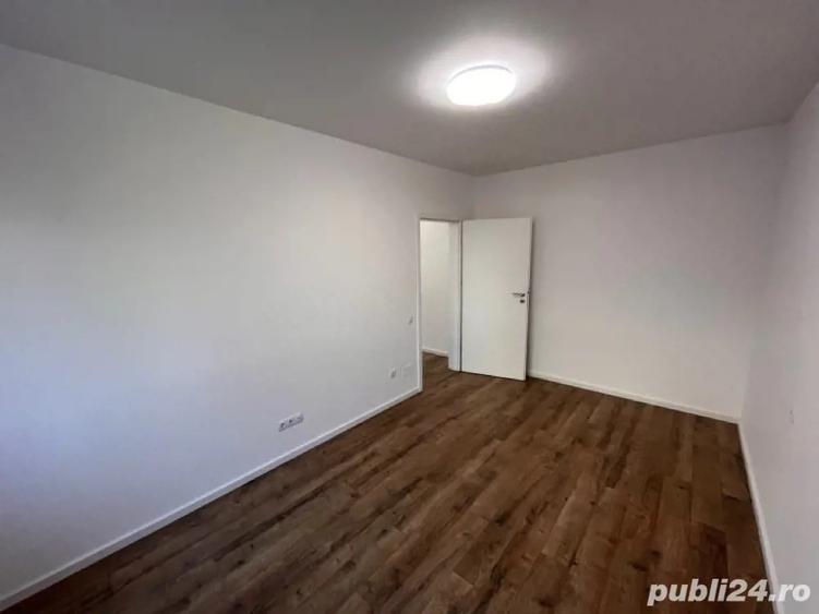 Ap de vanzare cu 2 camere ?i gradina nou finisat in Flore?ti zona Tau?iului parcare - 7