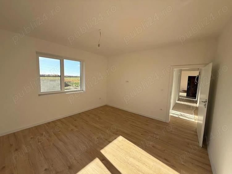 Ap 3 cam - 68 mp utili - curte 46 mp utili de vanzare - 2