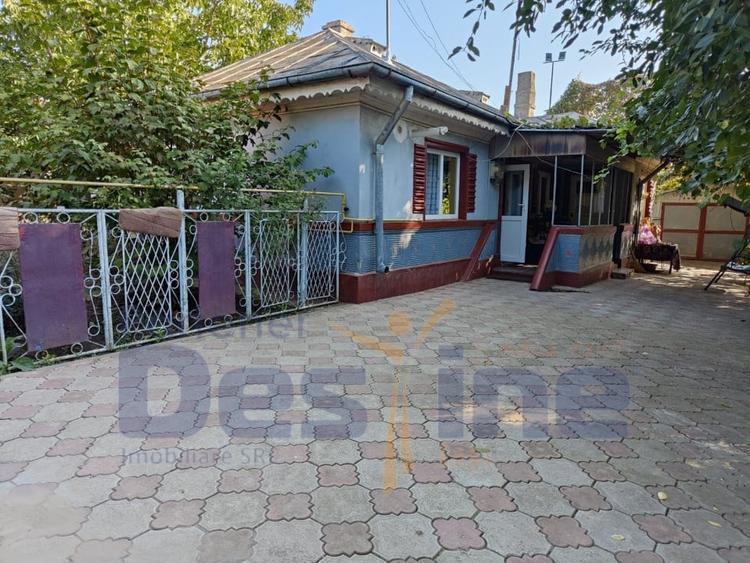 Casa batraneasca modernizata 74 mp + 73 mp anexe teren 585mp - 2