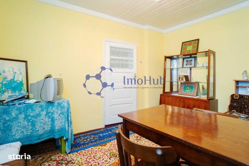 Teren de 2200 mp si casa in sat Voinesti, langa biserica - 2