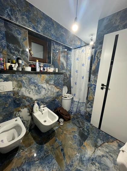 Apartament trei camere complet renovat - zona Blvd. Unirii - etaj 2/8 - 7