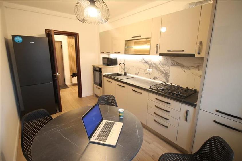 Bloc nou - langa Universitatea Bacovia - chirie 2 camere - mobilat si utilat com - 10