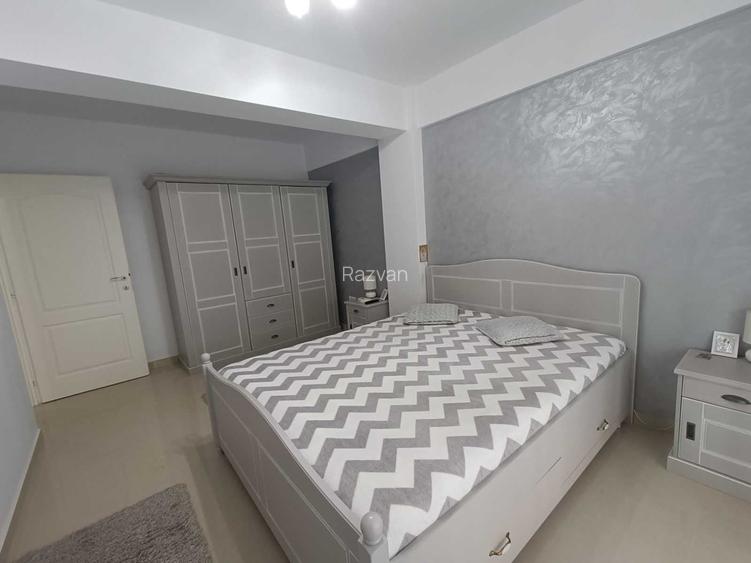 Intabulat.Vand apartament 2 camere decomandat, mobilat si utilat, 2 locuri parcare, lift, boxa.
