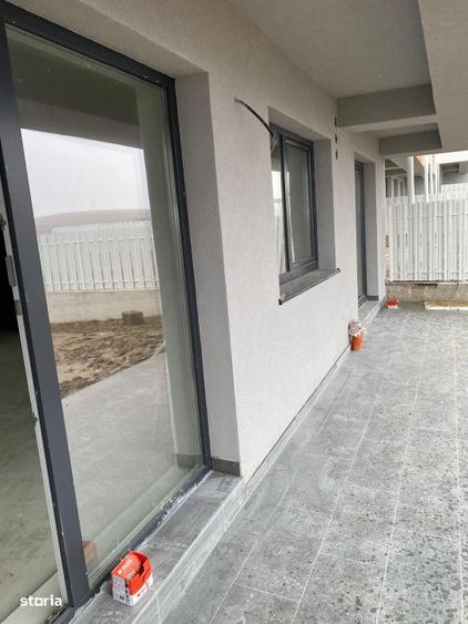 Apartament tip casa, 3 camere pe 2 nivele, gradina privata plus garaj - 1