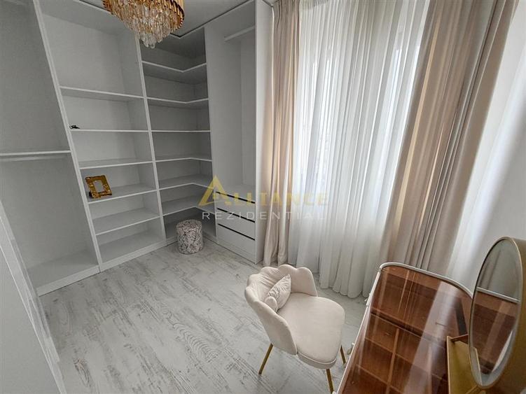 Vila individuală P+1E - 4 camere - 2 băi - teren 400mp - mobilată - 7