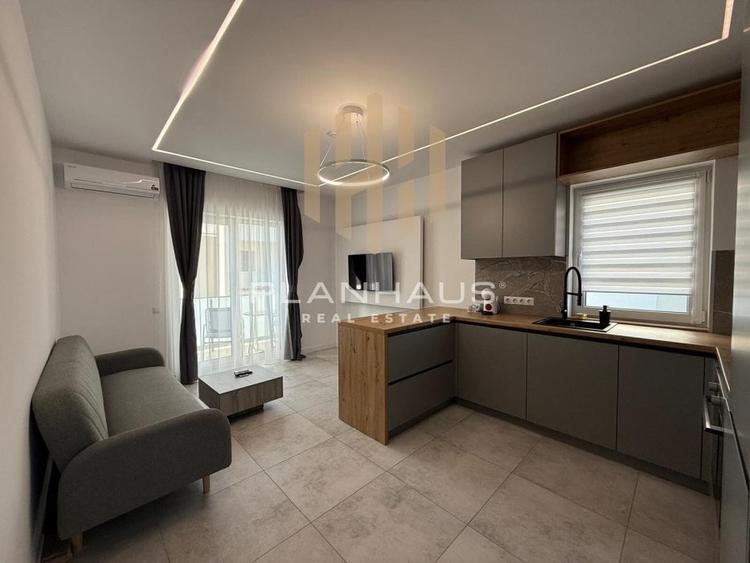 Inchiriere-ultramodern apartament zona rezidentiala ,3 camere,etaj 1,loc de parc - 14