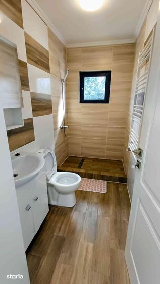 Casă cu 4 camere cu Teren 470 Mp în Holboca