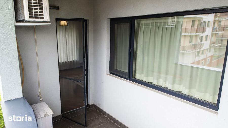 Apartament cu 2 camere semidecomandat, mobilat în Borhanci