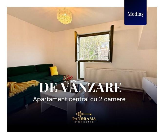 Apartament la etajul 1 cu terasa de 21.5 mp, situat în zona centrală - 1
