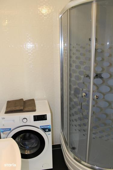 Apartament cu 2 camere, mobilat în Central