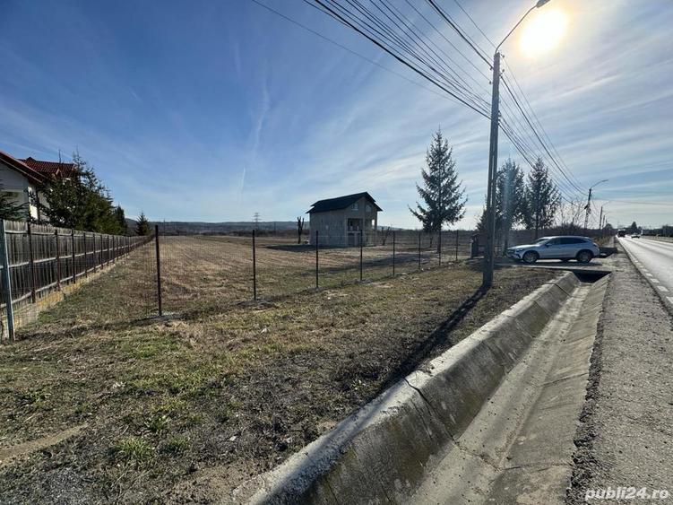 de inchiriat -Teren intravilan (1,27 ha) cu deschidere 52 m la DN73 cu cladire P+2 - 1
