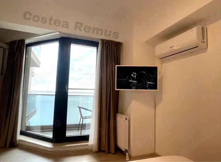 Studio Solid house Butoaie,dormitor separat,loc parcare subteran inclus in pret, mobilat, vedere lac - 9