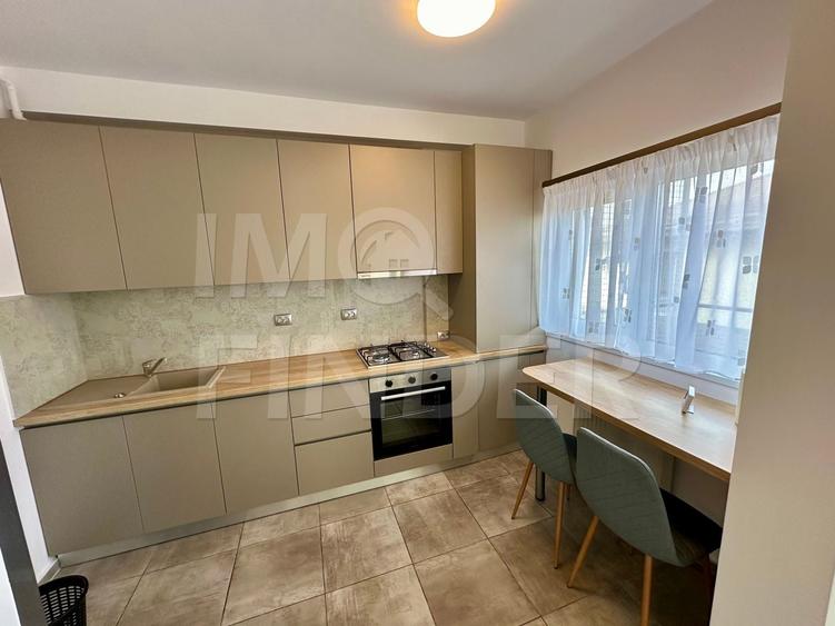 Apartament cu 2 camere semidecomandat, mobilat în Borhanci