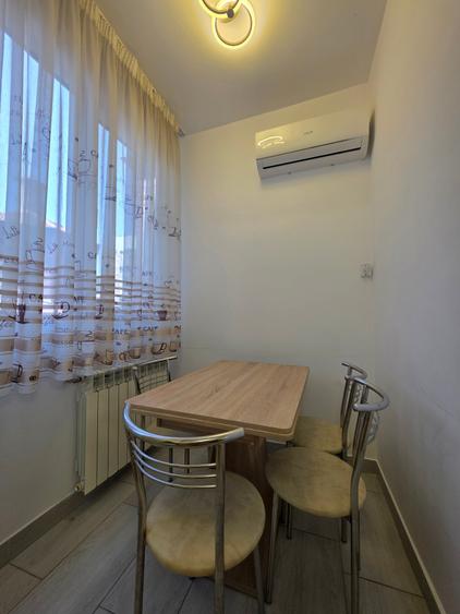 Apartament cu 2 camere semidecomandat în P-ța Universității