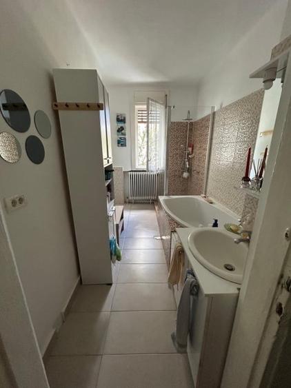 Casă individuală cu 4 camere cu Canalizare în Central