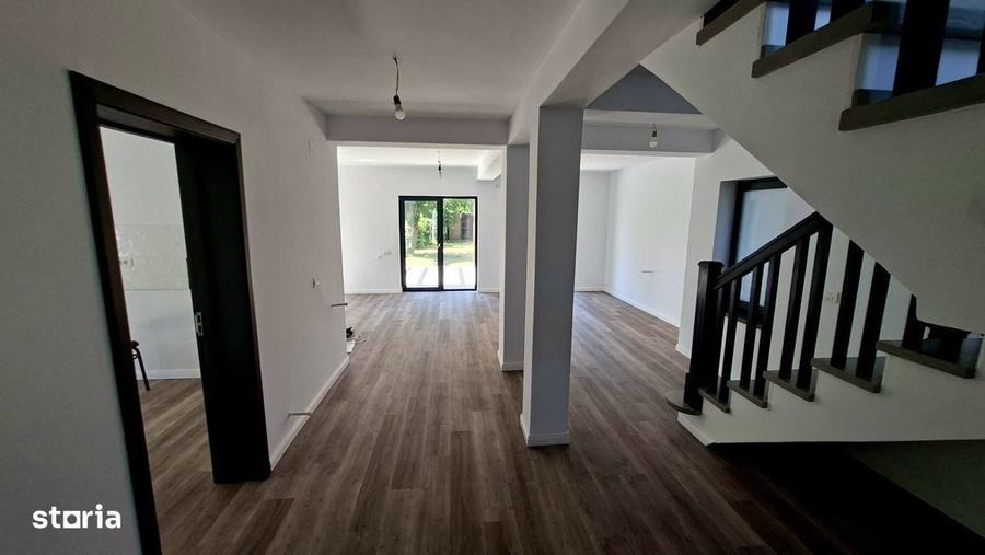 Casă cu 4 camere în Bascov