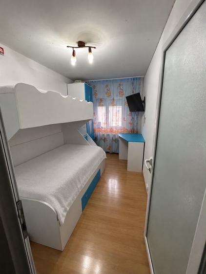 Ap. 3 camere M 17 etaj 4/4 str Argesului. Se vinde mobilat si utilat complet. Centrala termica,aer conditionat,usi si geamuri termopan,izolatie ext. - 3