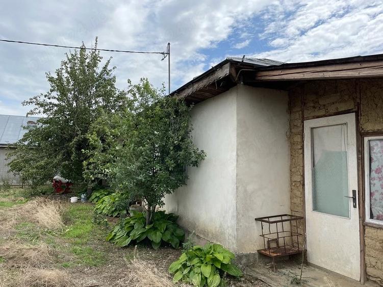 Casă cu Teren 970 Mp în Central