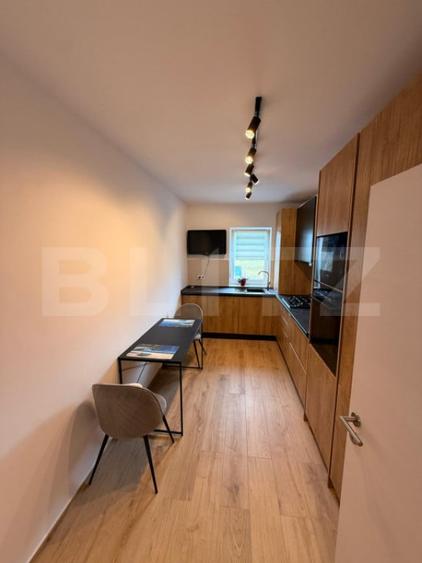 Apartament cu 2 camere ,etaj 1, 70mp util , balcon 12mp, Bar - 2