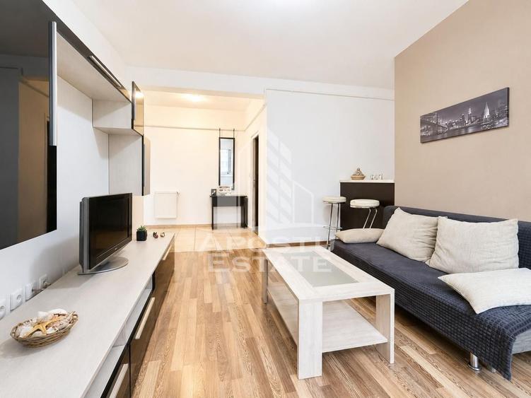 Apartament cu 2 camere semidecomandat, mobilat în UTA