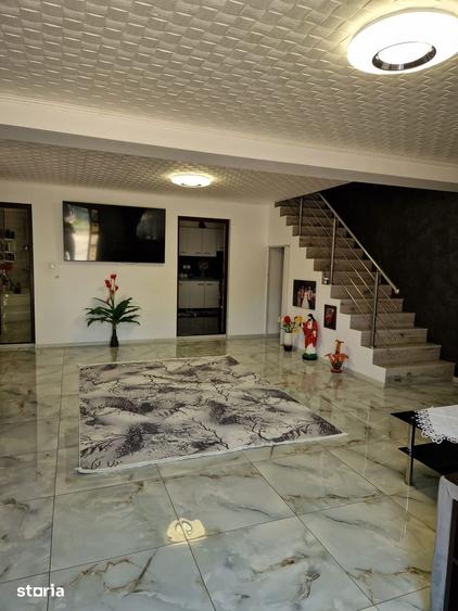 Casă cu 4 camere cu Teren 259 Mp în Comana