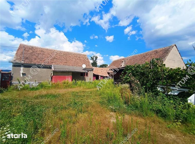 Casă cu 4 camere decomandat cu Teren 1650 Mp în Porumbacu de Jos