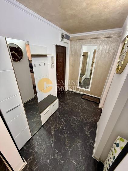 Apartament cu 2 camere semidecomandat, mobilat în Podu Roș