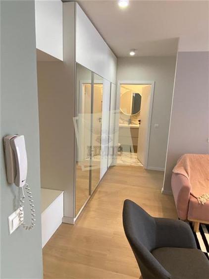 Apartament cu 2 camere semidecomandat, mobilat în Central